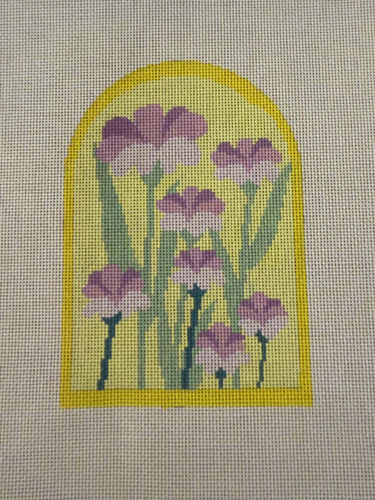 Pink bouquet in a yellow arched window