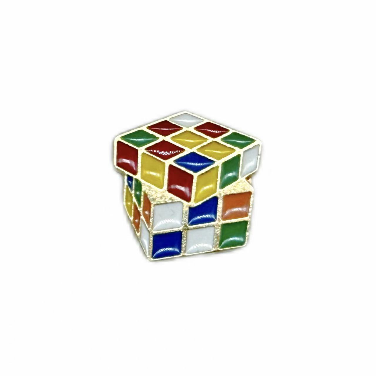 Colorful rotating cube - needle minder