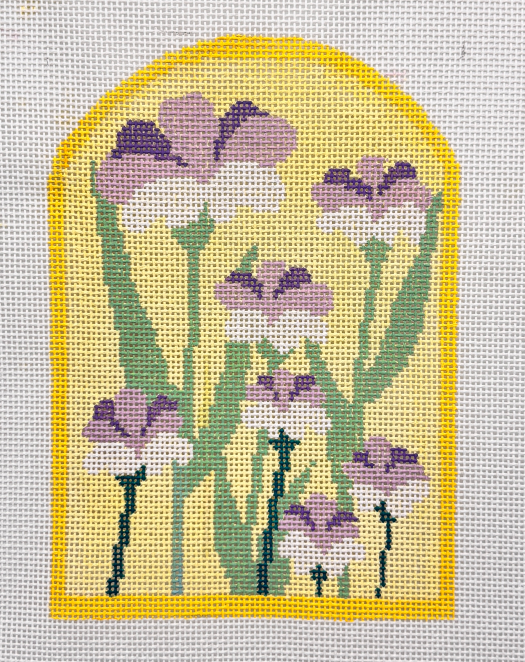 Pink bouquet in a yellow arched window