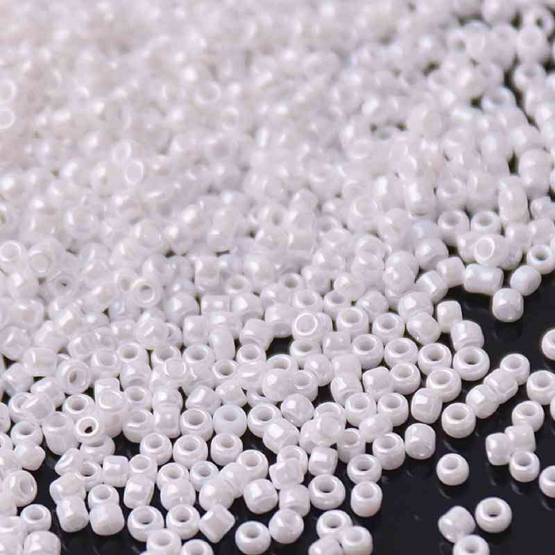 White Beads of Different Textures - Oiled white