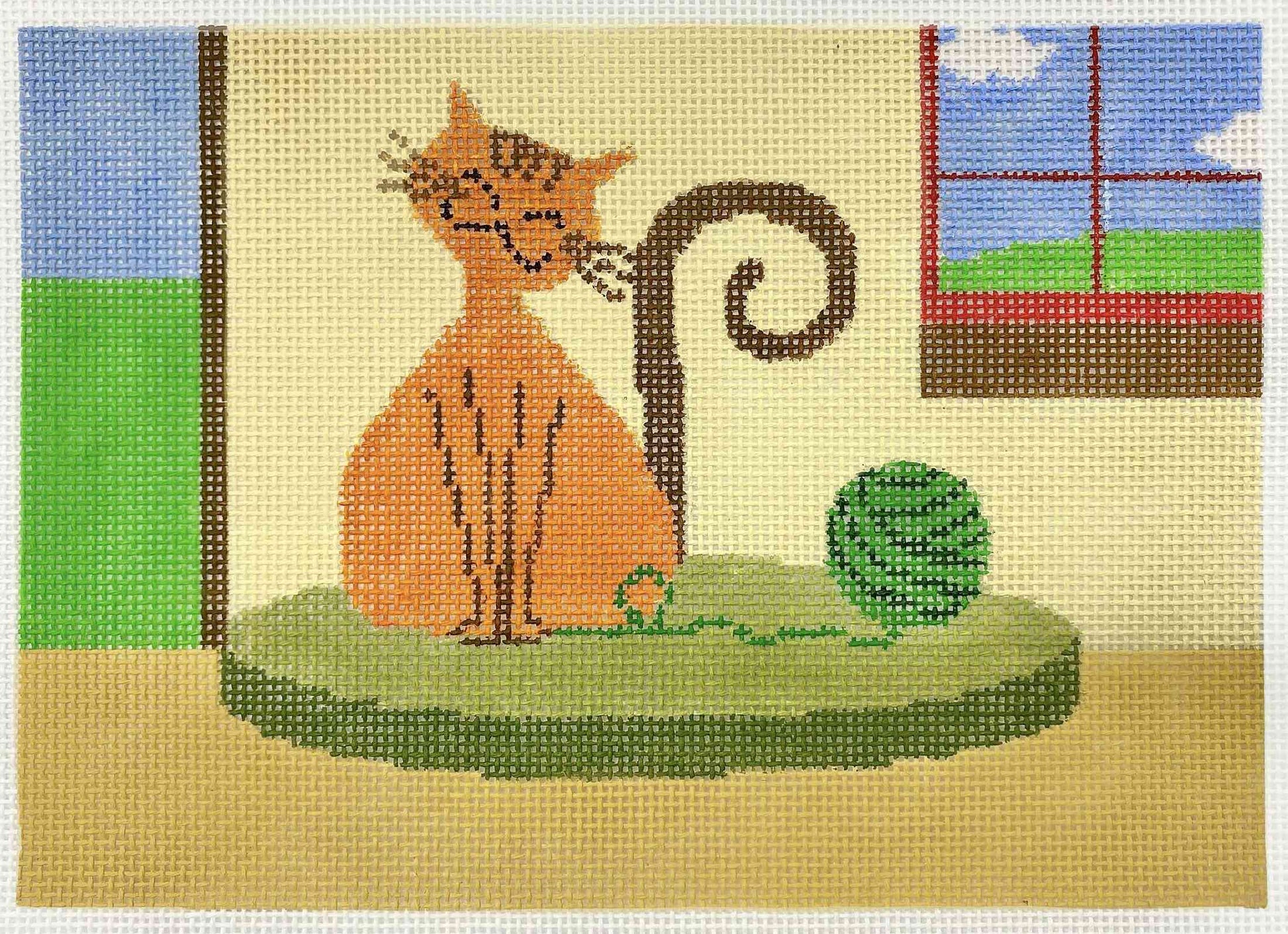 Cat playing with yarn