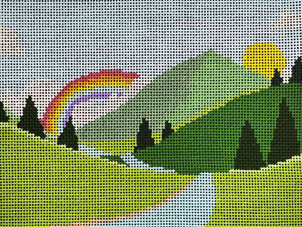 The Peaking Sun and Rainbow